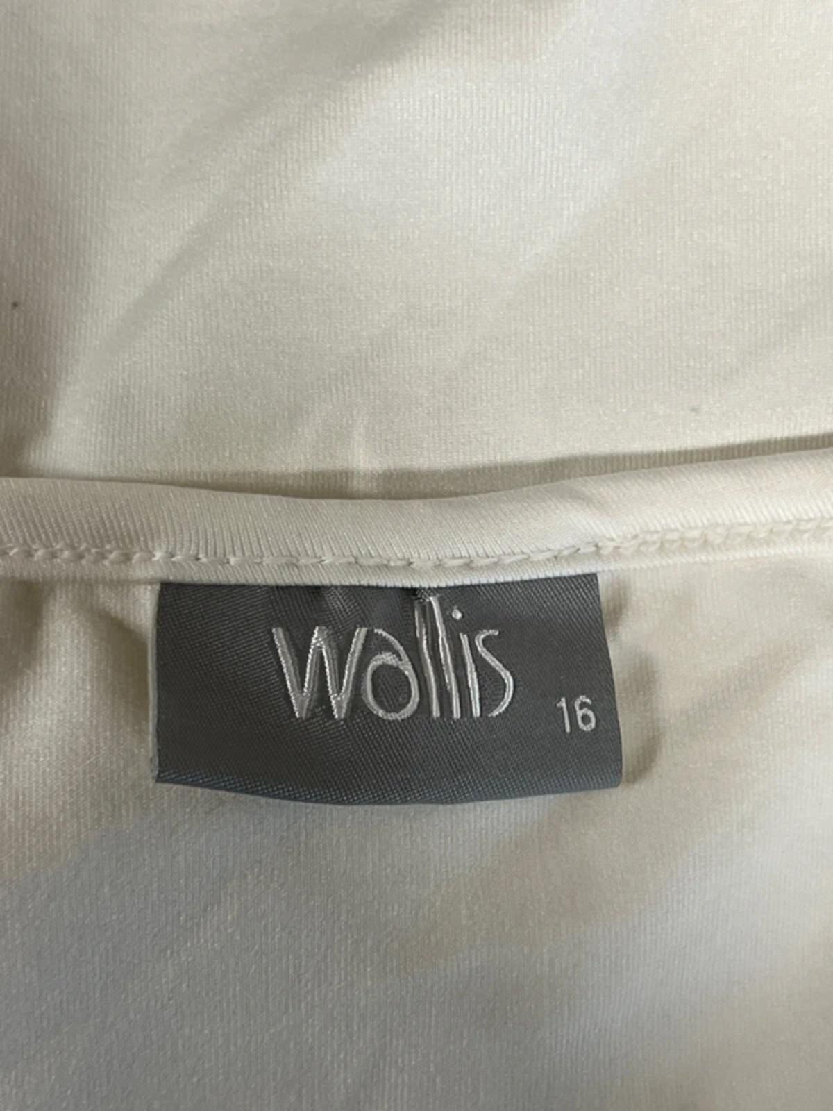 Wallis | 16 | White vest top