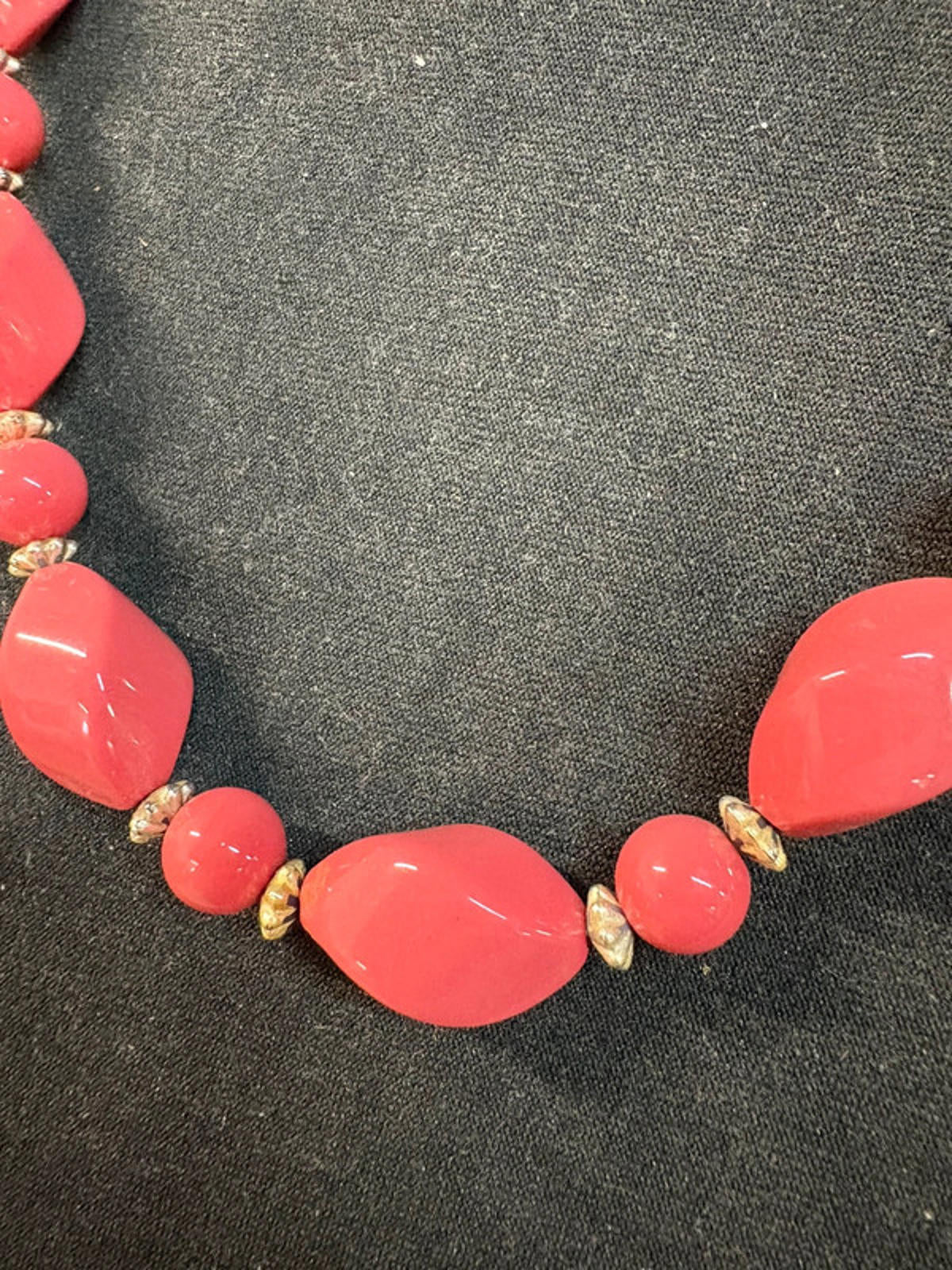 Coral coloured beaded necklace