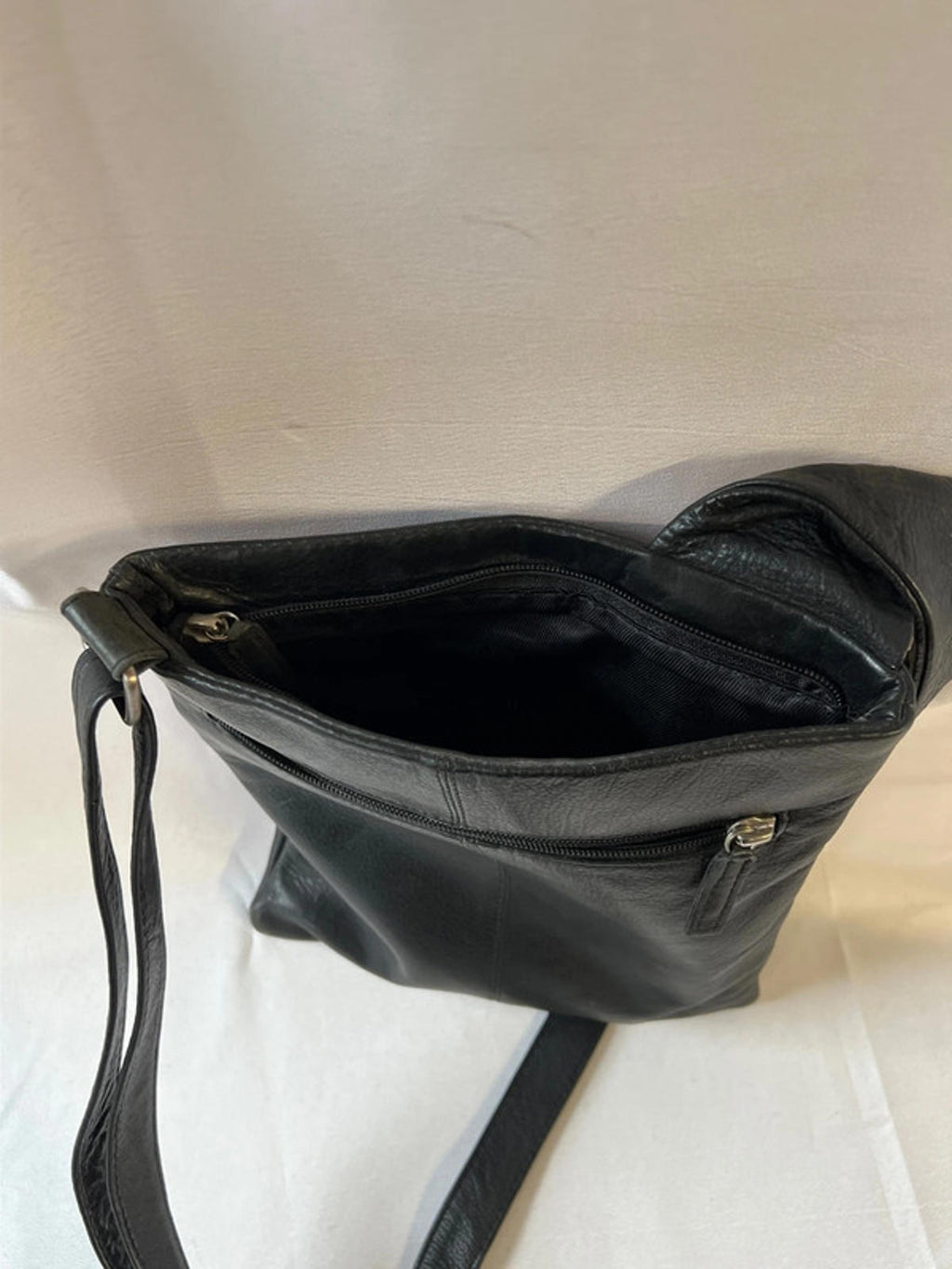 Taurus | Black leather cross body bag