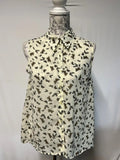 Be Beau | 18 | Butterfly vest top/blouse