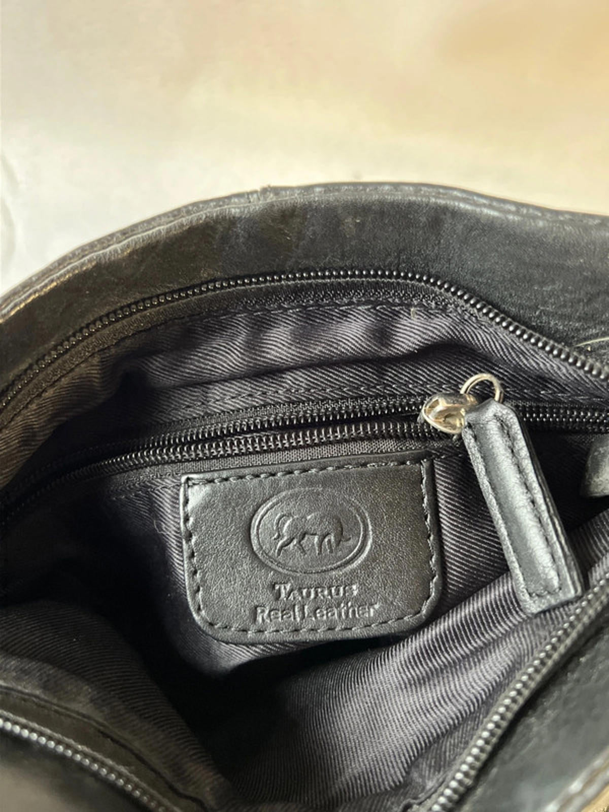 Taurus | Black leather cross body bag