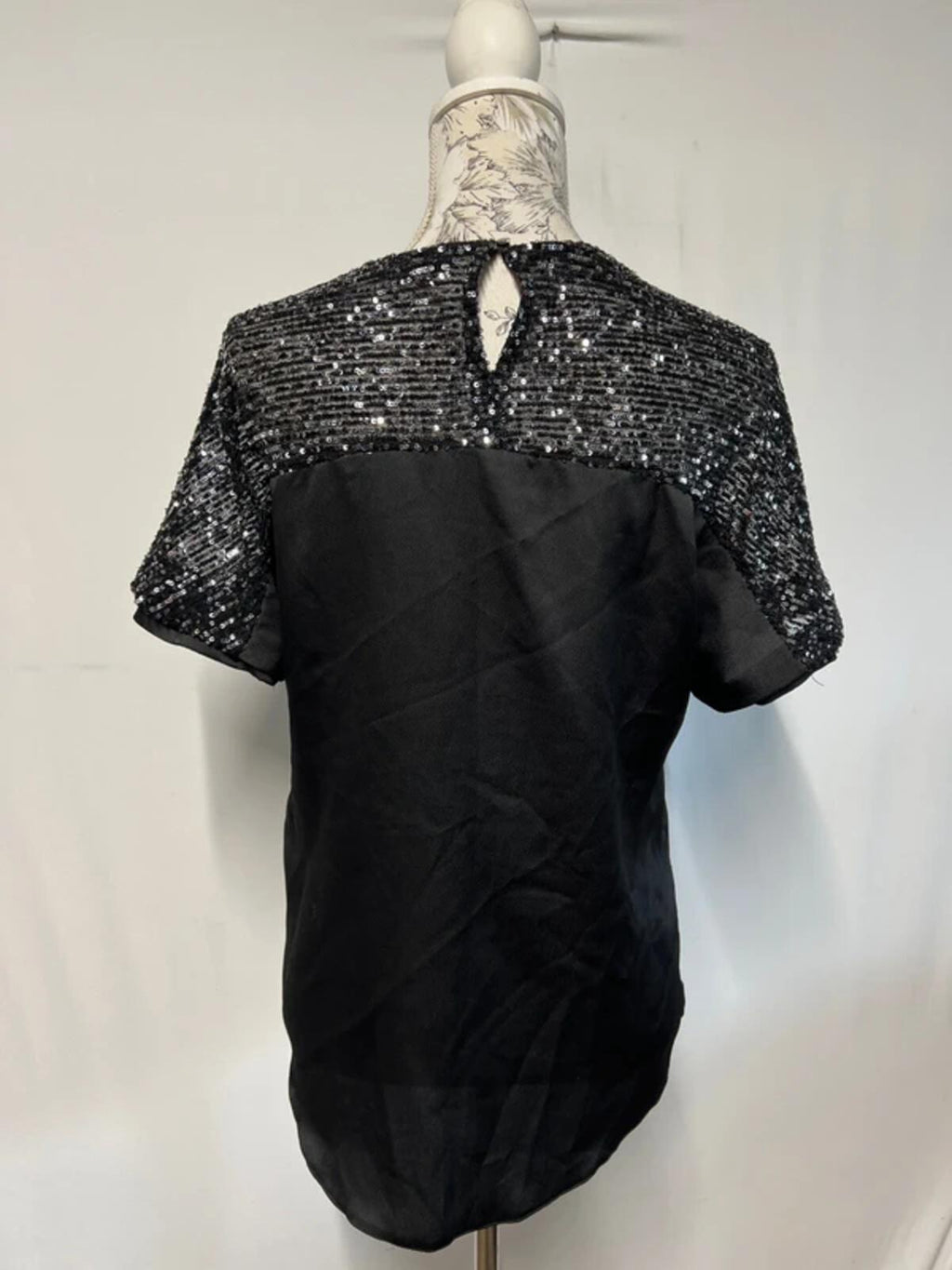 Dorothy Perkins | 8 | Black sparkly top |