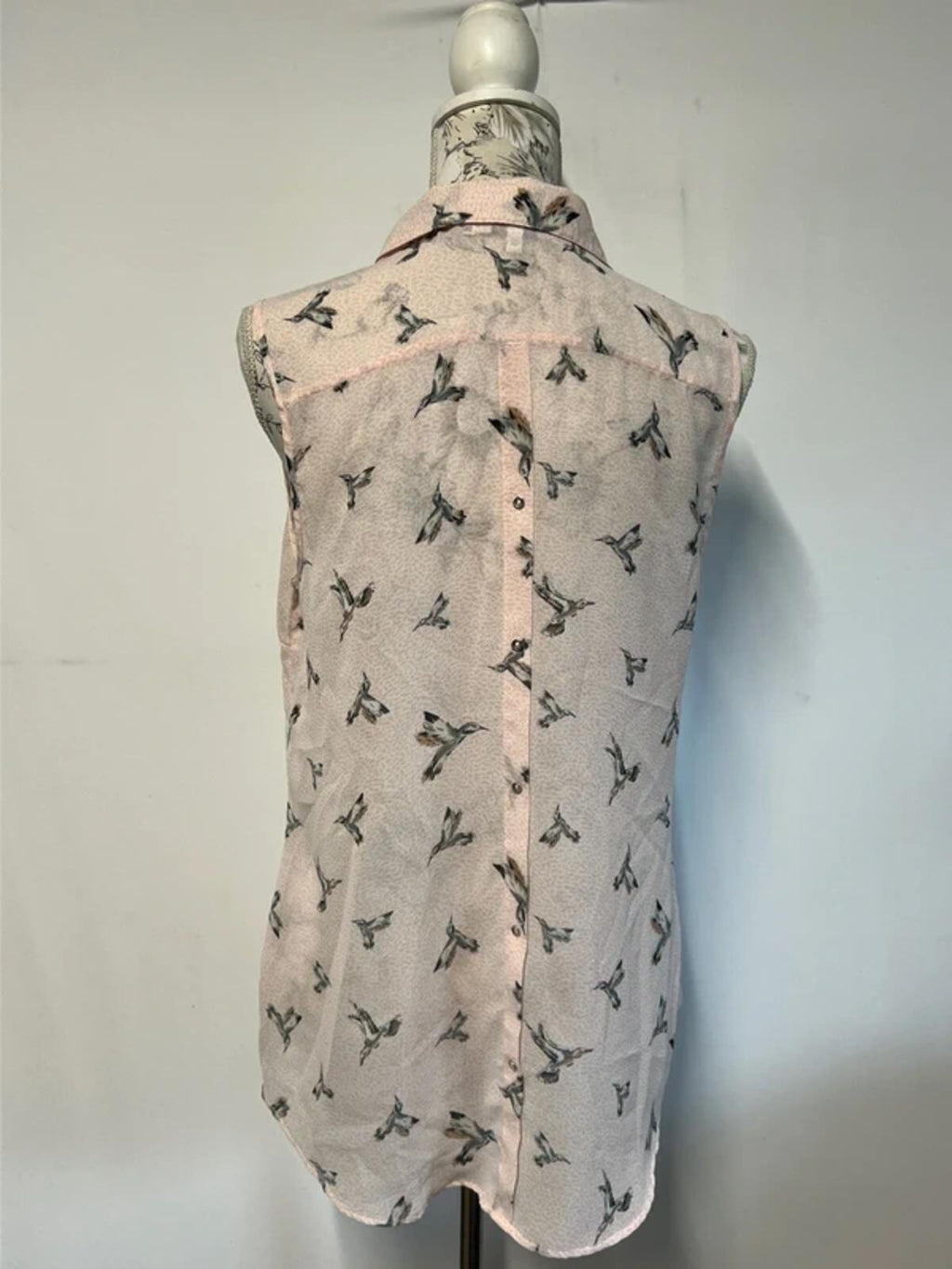 Next | 14 | Pink vest blouse with bird pattern