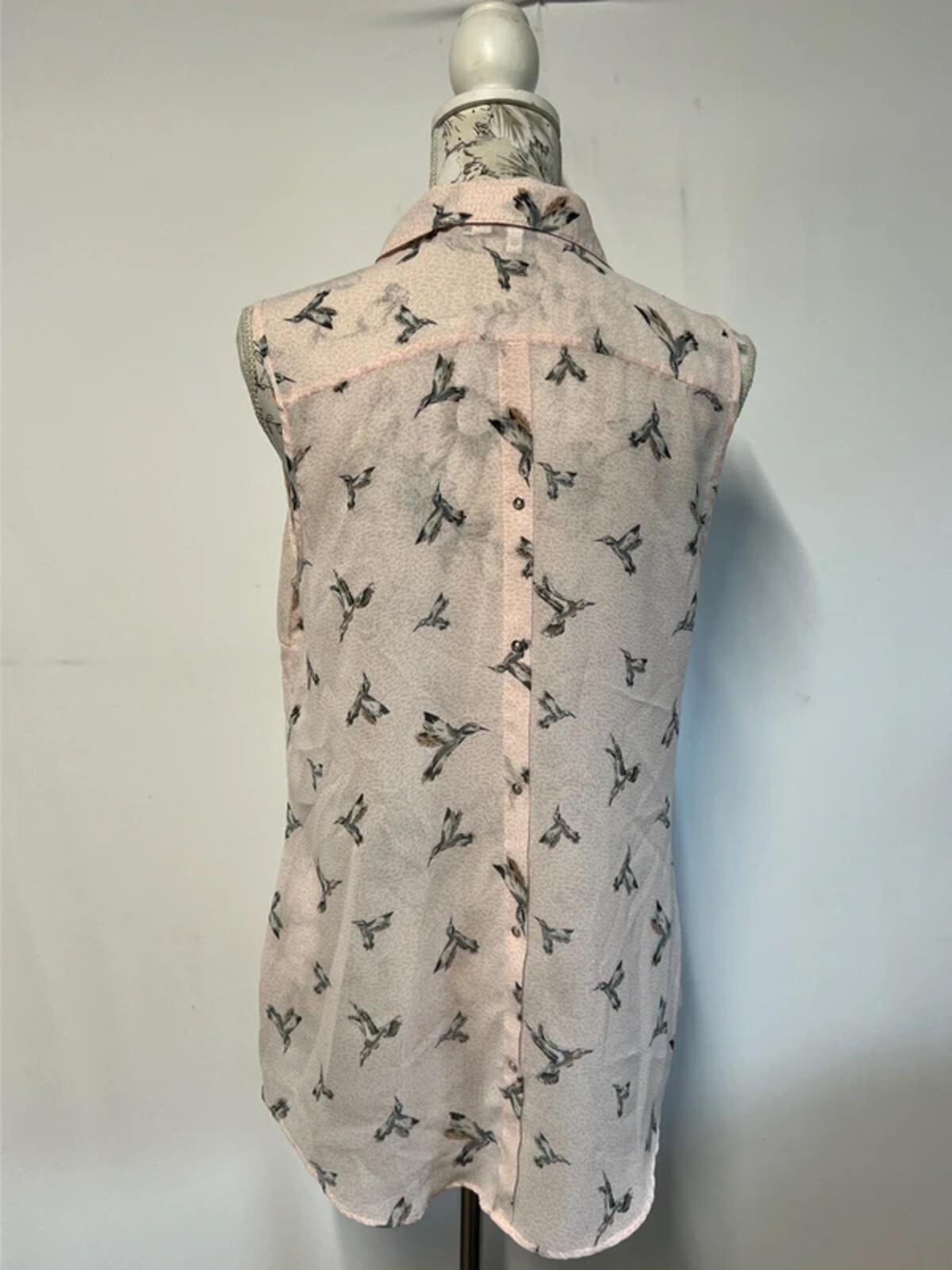 Next | 14 | Pink vest blouse with bird pattern
