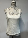Wallis | 16 | White vest top