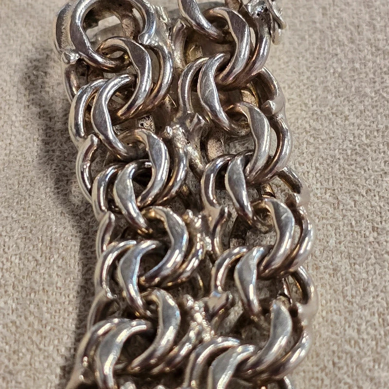 A 1960s hallmarked five row gate link bracelet