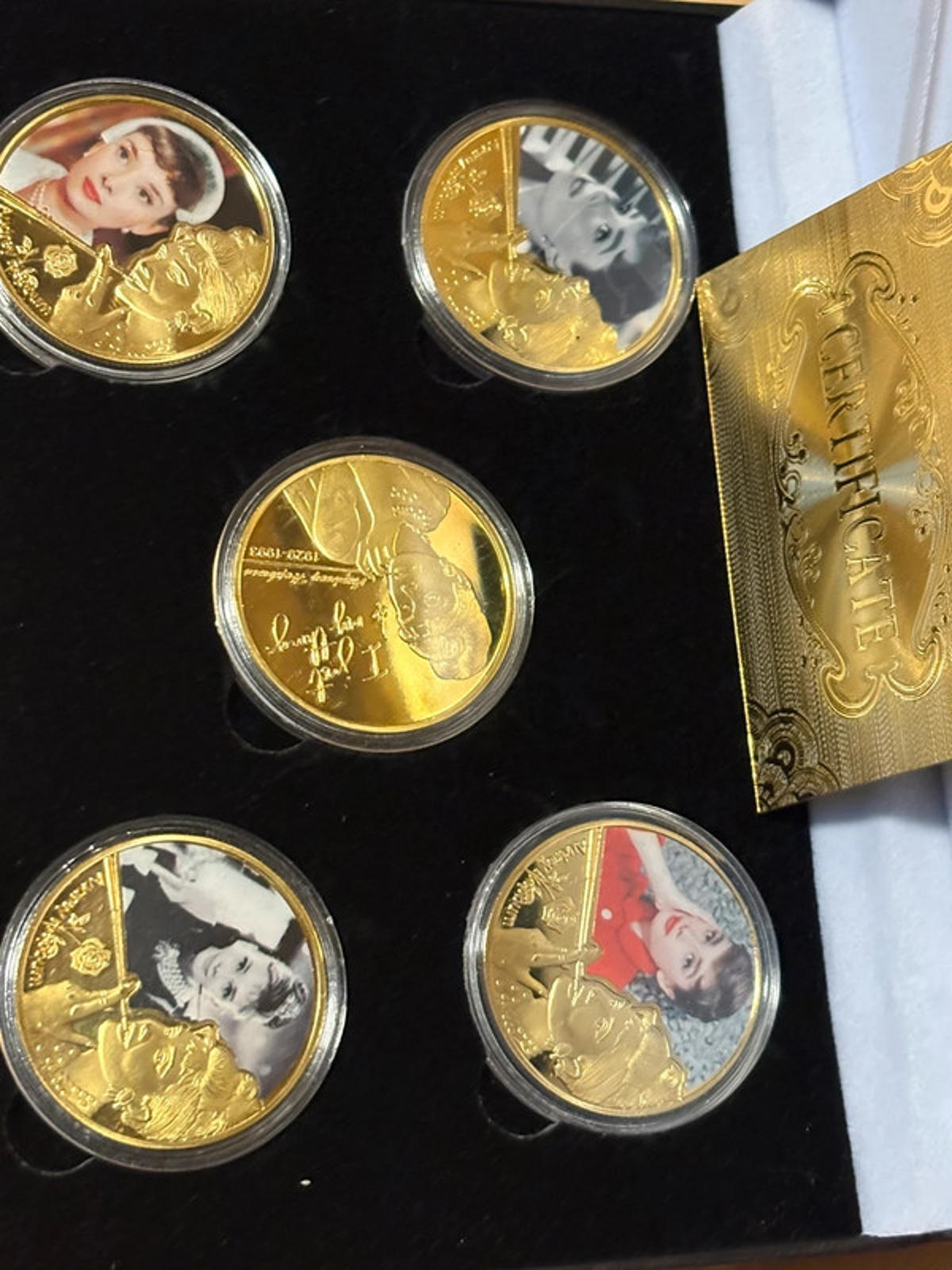 Set of 5 gold plated Audrey Hepburn commemorative coins