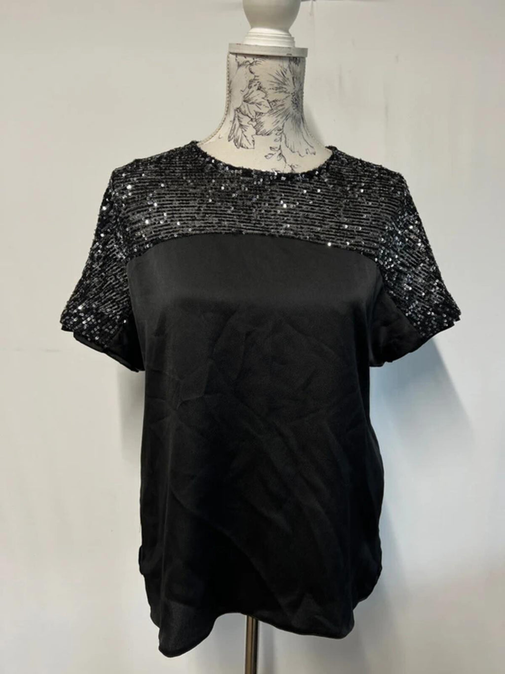 Dorothy Perkins | 8 | Black sparkly top |