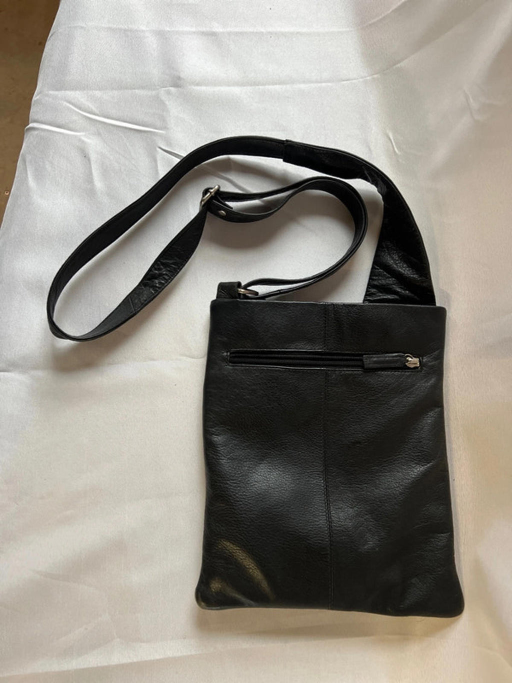 Taurus | Black leather cross body bag