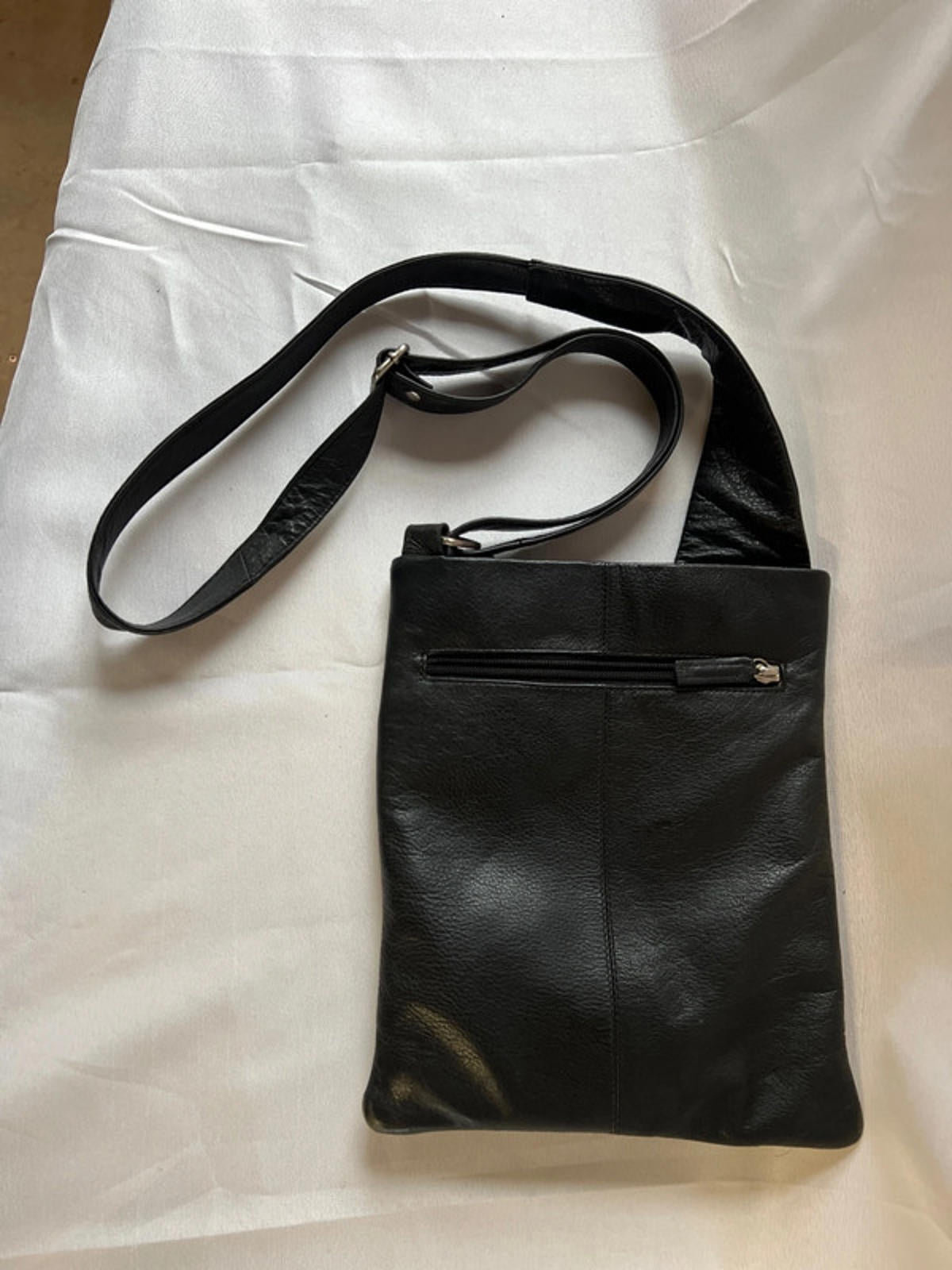 Taurus | Black leather cross body bag