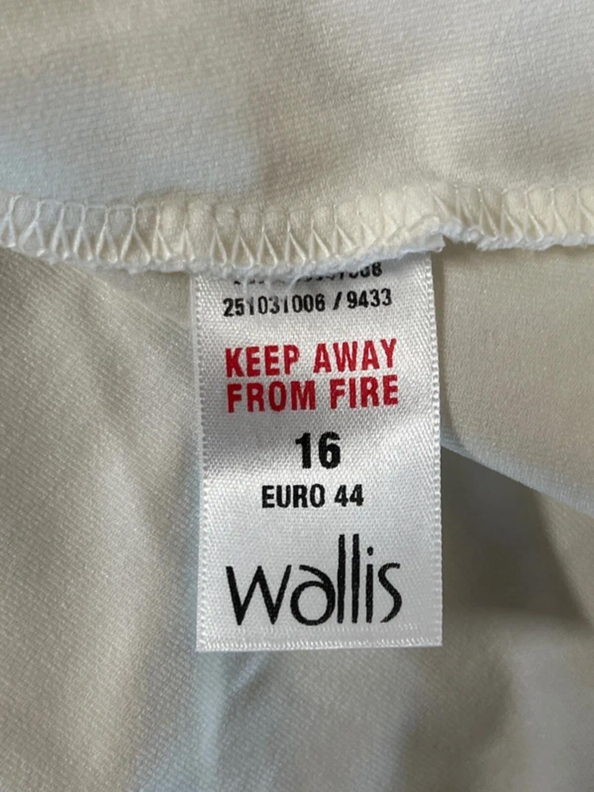 Wallis | 16 | White vest top