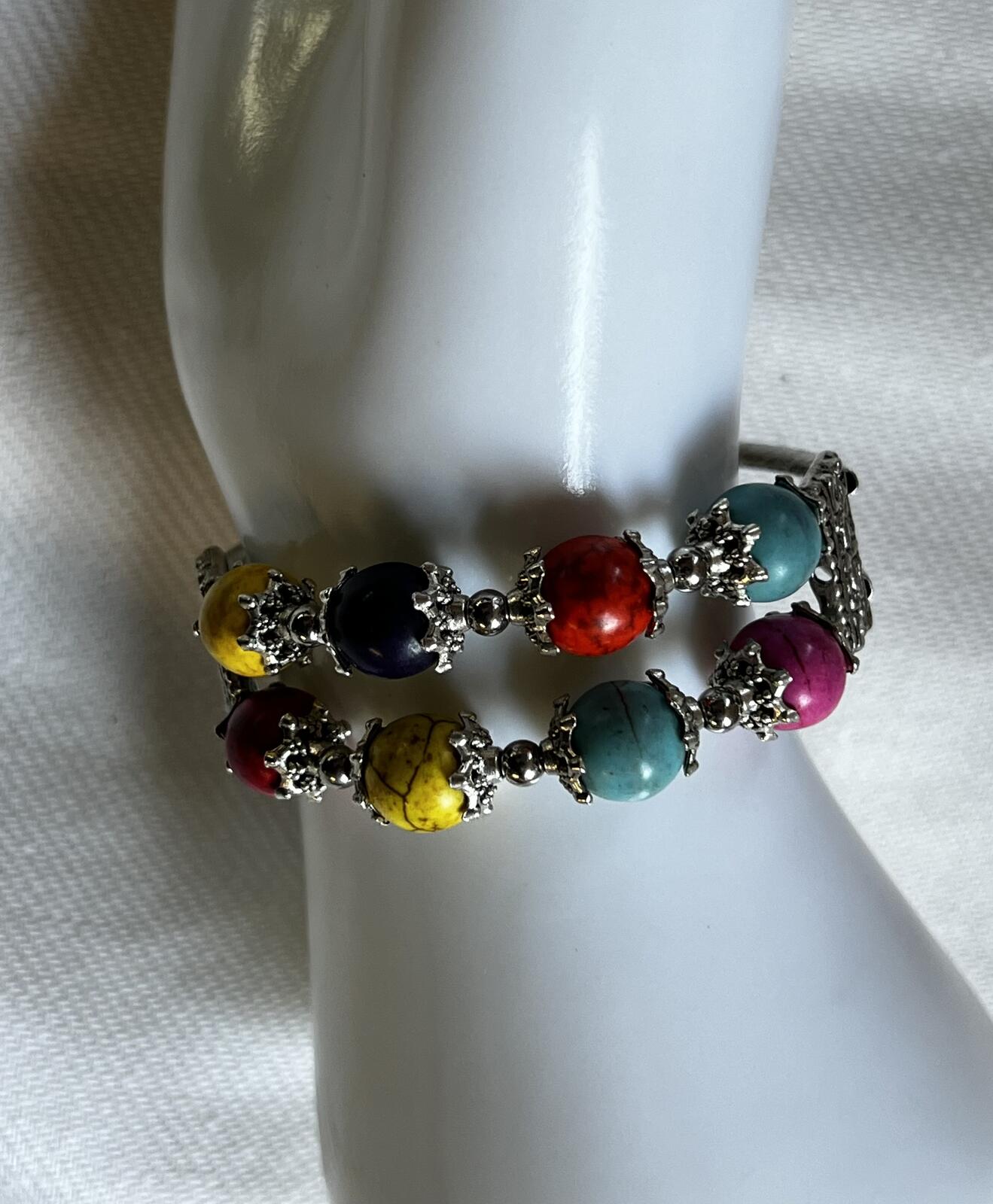 Multi coloured white metal bracelet
