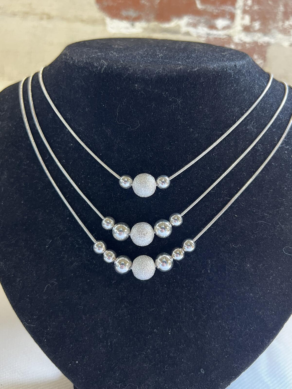 Silver three tier drop necklace