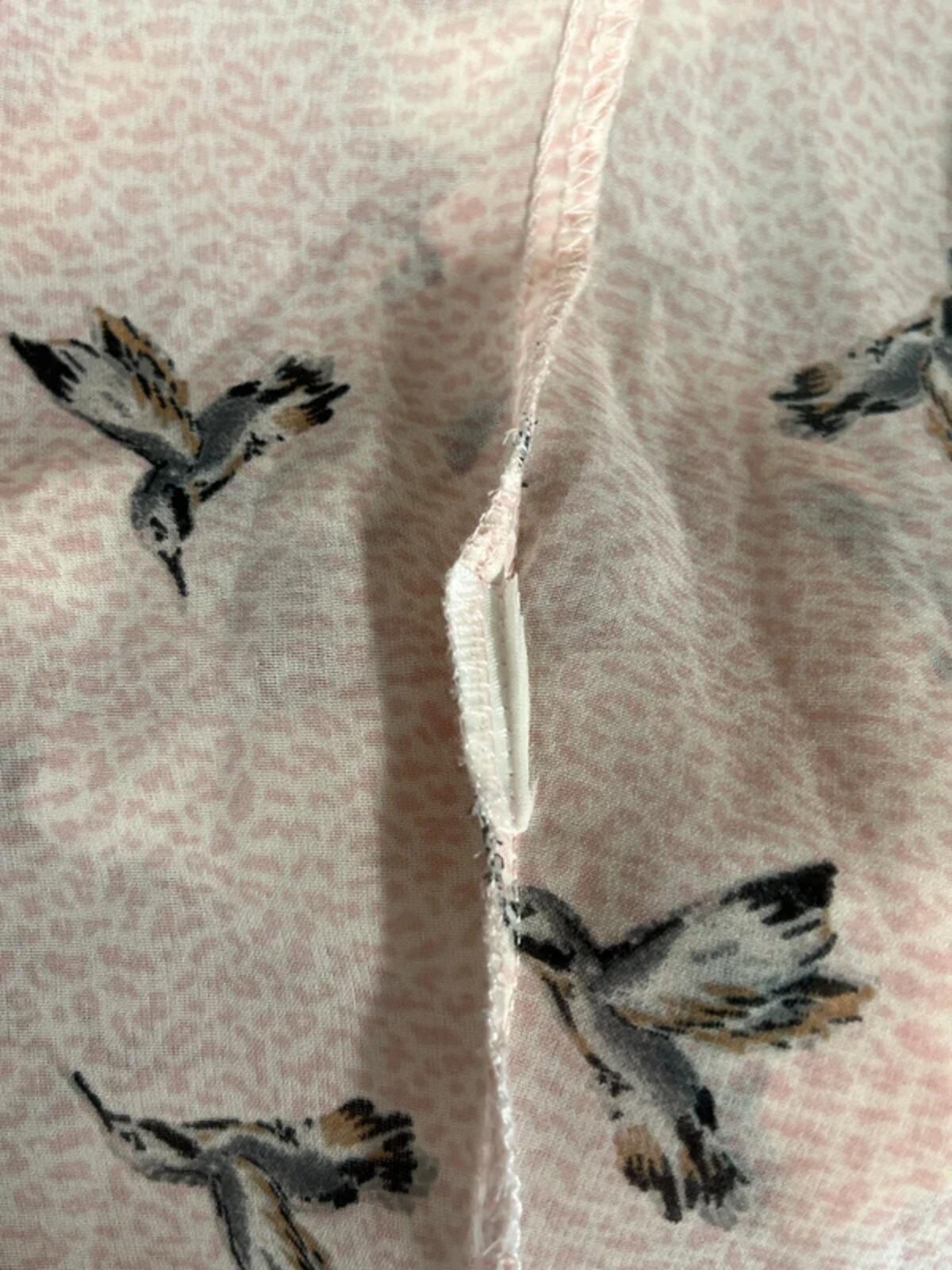 Next | 14 | Pink vest blouse with bird pattern