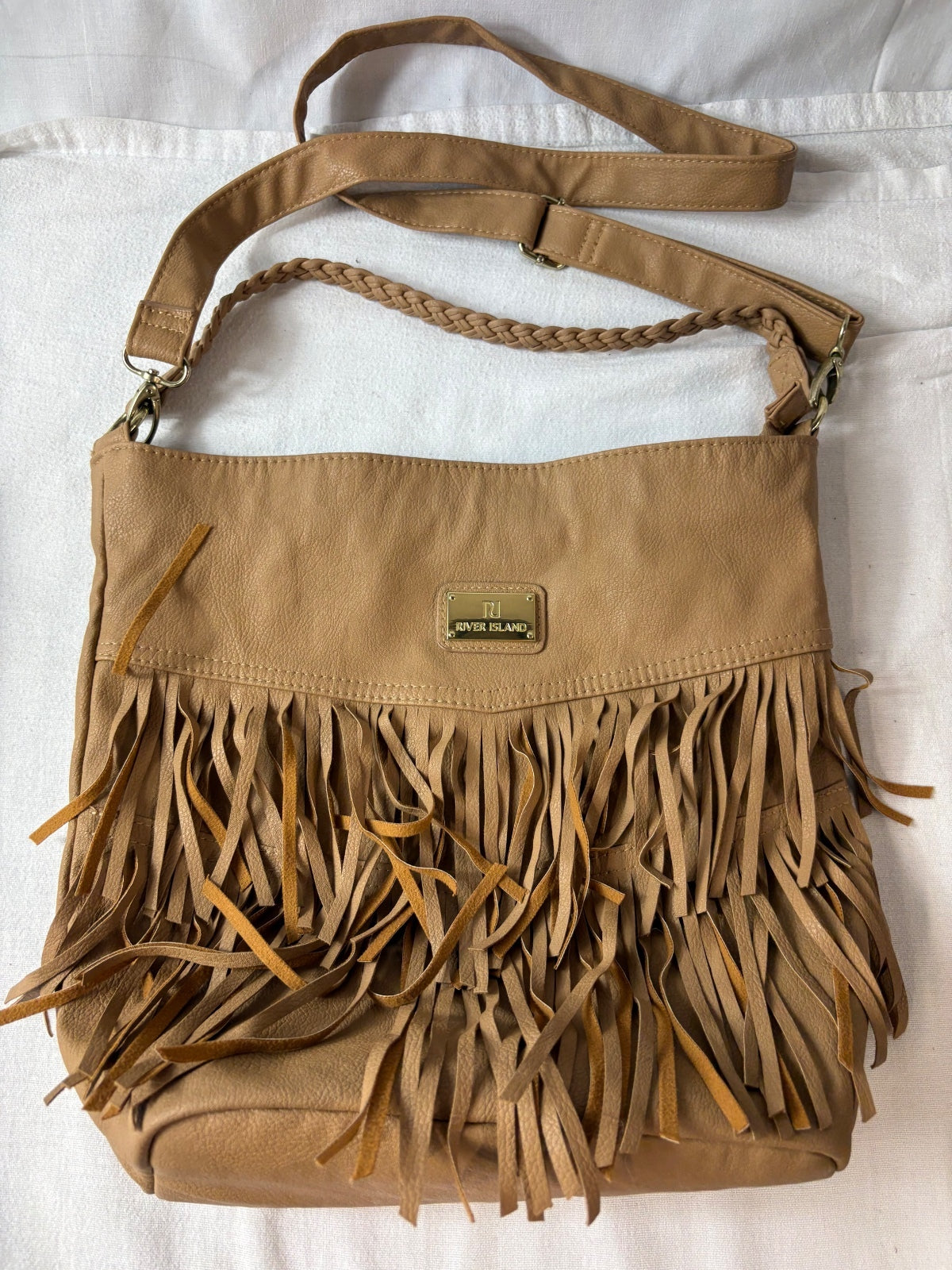 Brown river island tassel bag