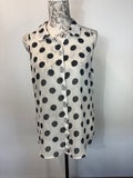 Next Sleeveless spotted blouse