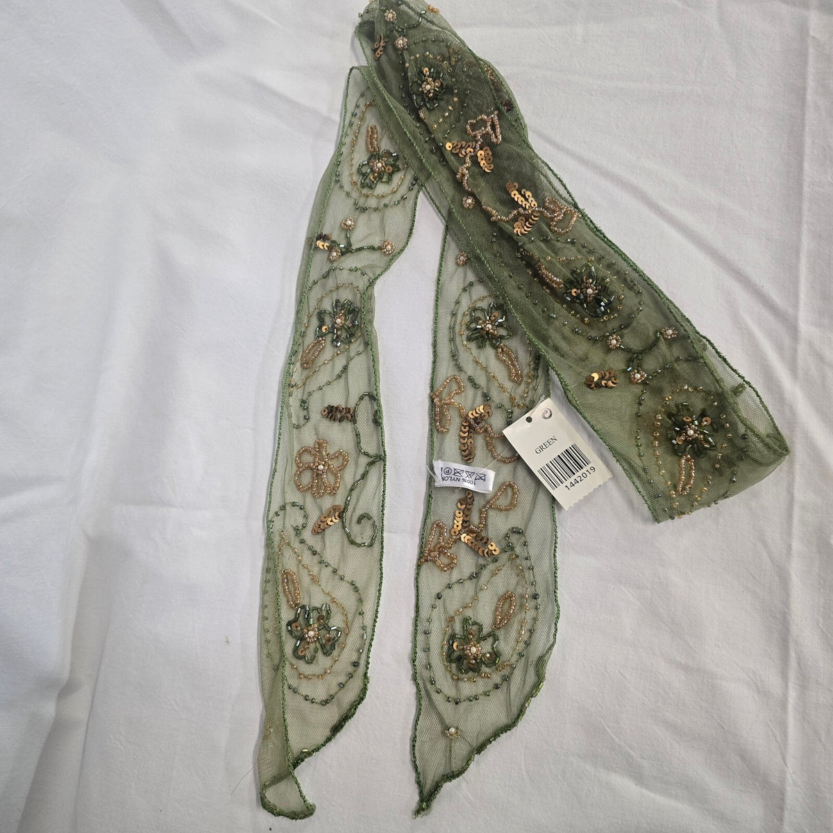 Atmosphere brand green scarf embellished with gold sequins and beads.