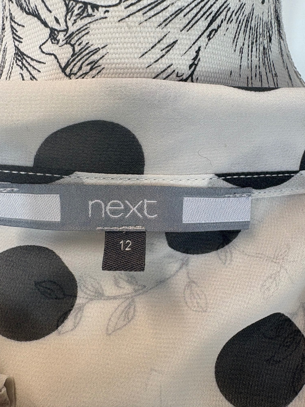 Next Sleeveless spotted blouse
