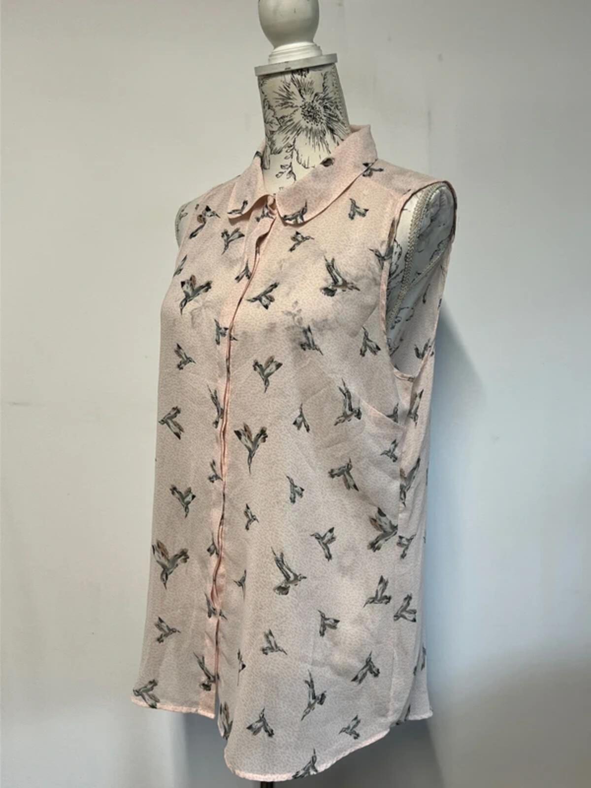 Next | 14 | Pink vest blouse with bird pattern