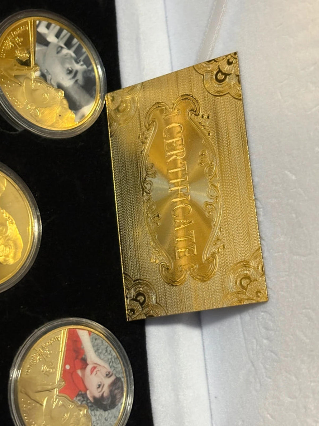 Set of 5 gold plated Audrey Hepburn commemorative coins