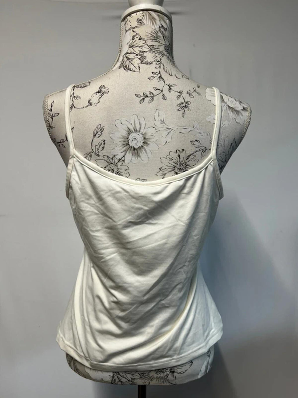 Wallis | 16 | White vest top