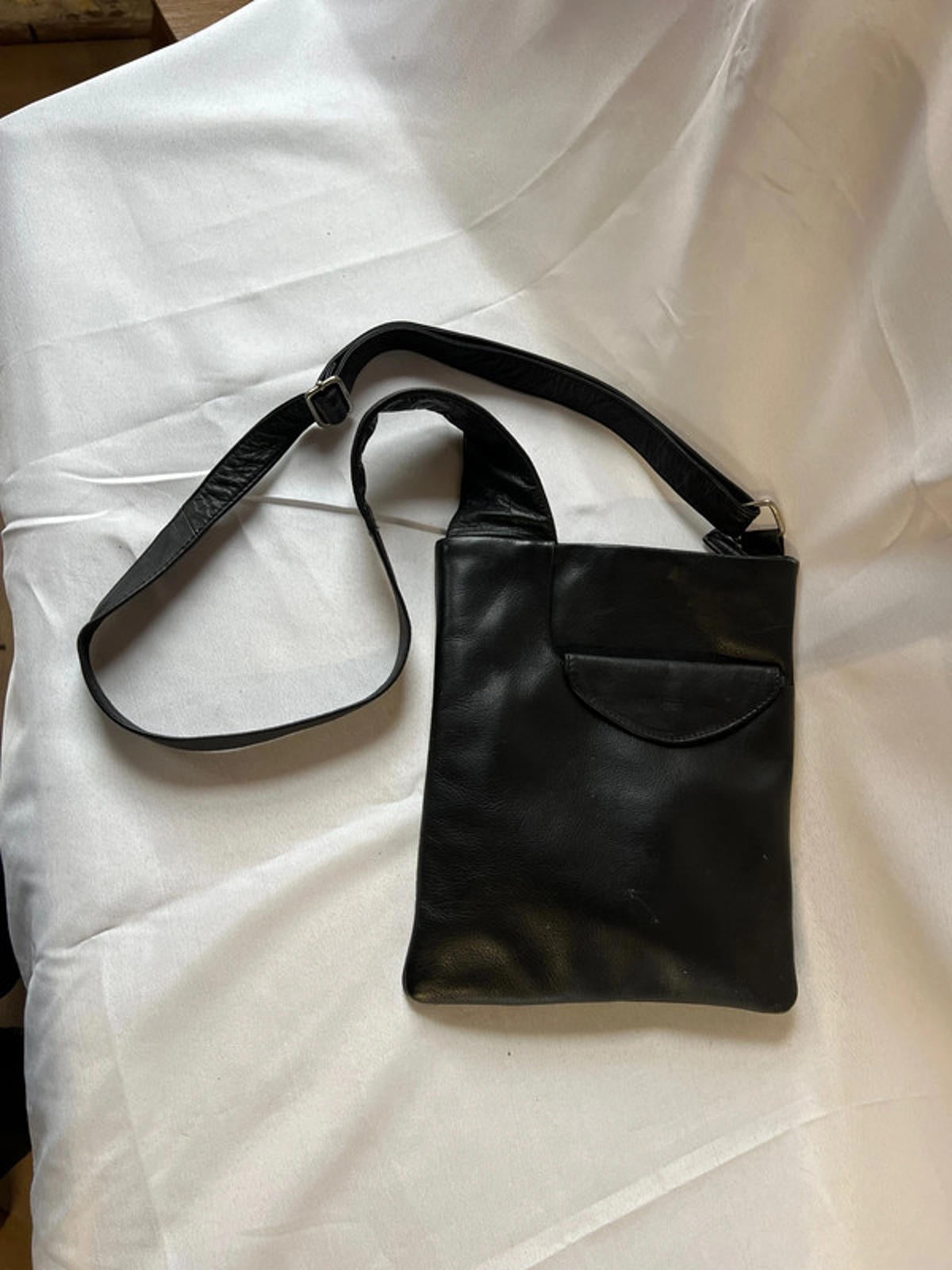 Taurus | Black leather cross body bag