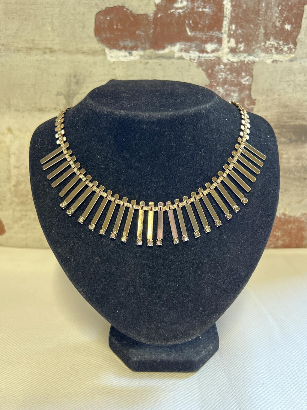 Gold tone dress costume necklace