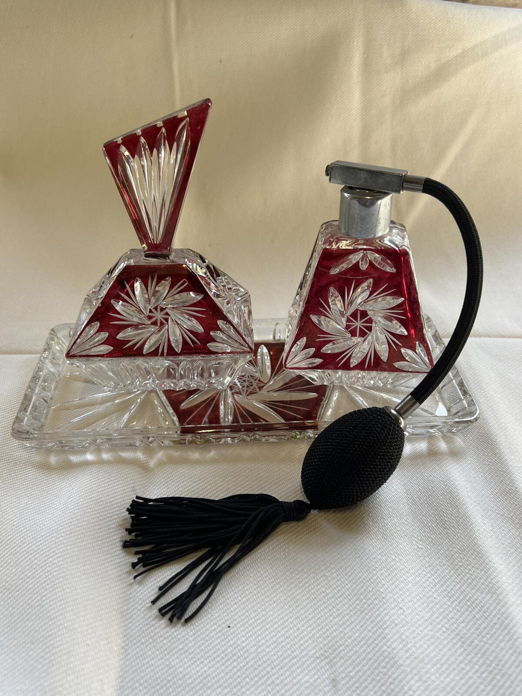Vintage vanity set featuring cut-to-clear crystal perfume bottles