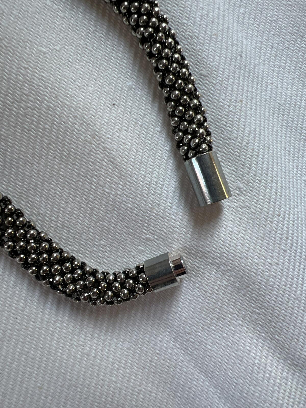 Thick silver tone necklace
