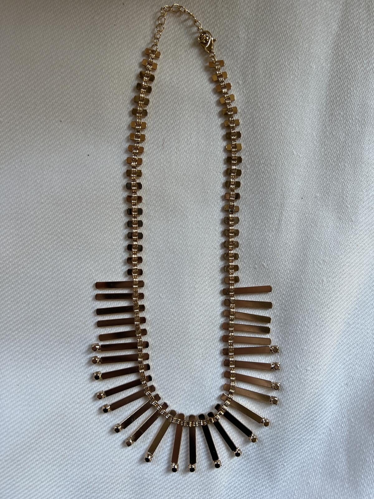 Gold tone dress costume necklace