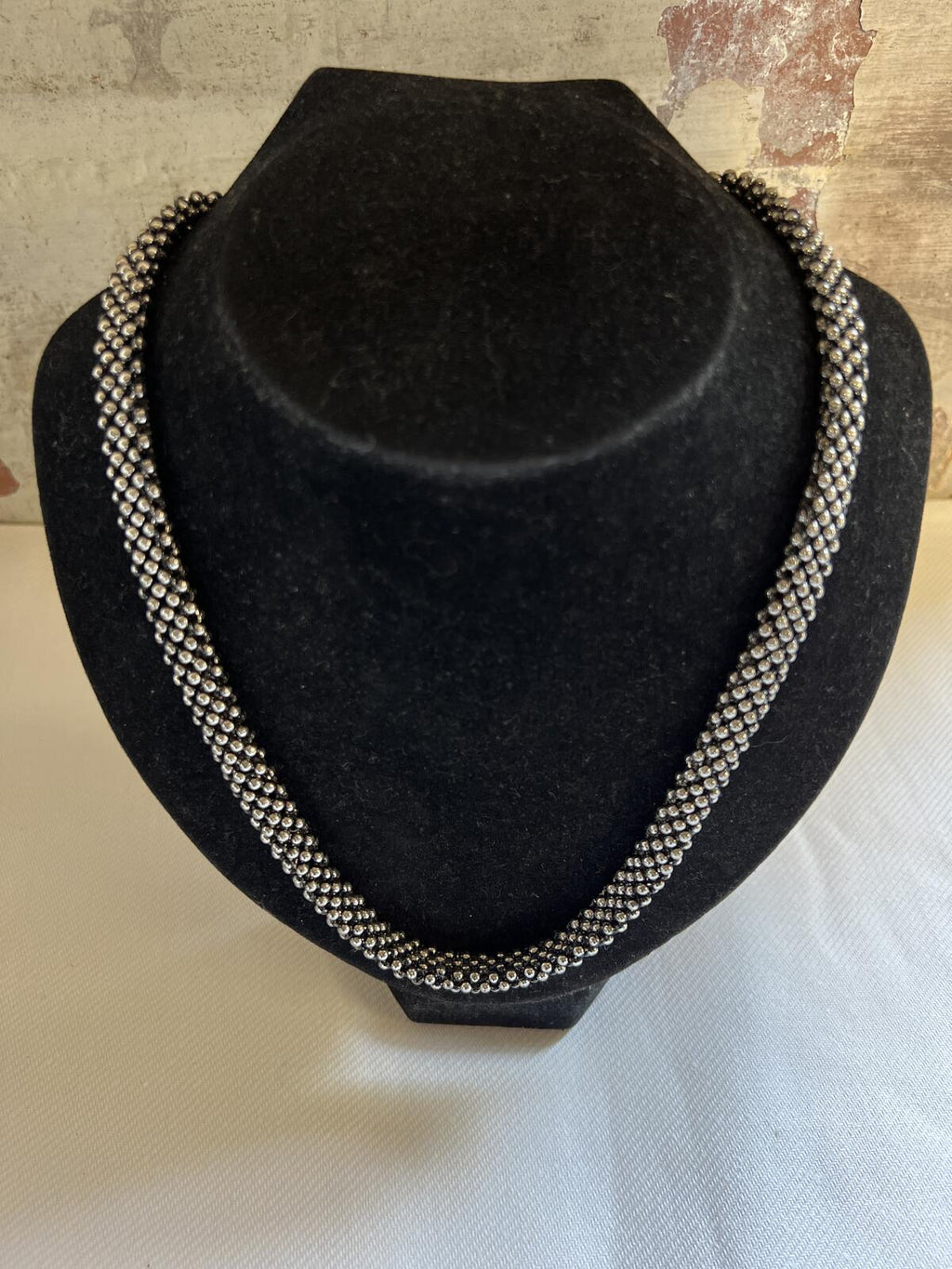 Thick silver tone necklace