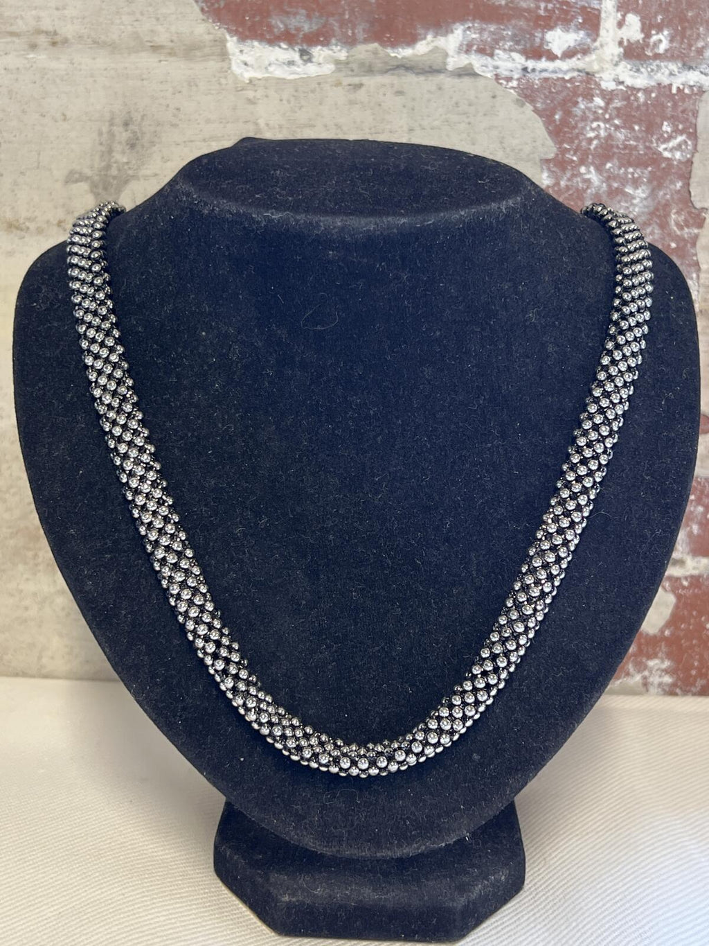 Thick silver tone necklace